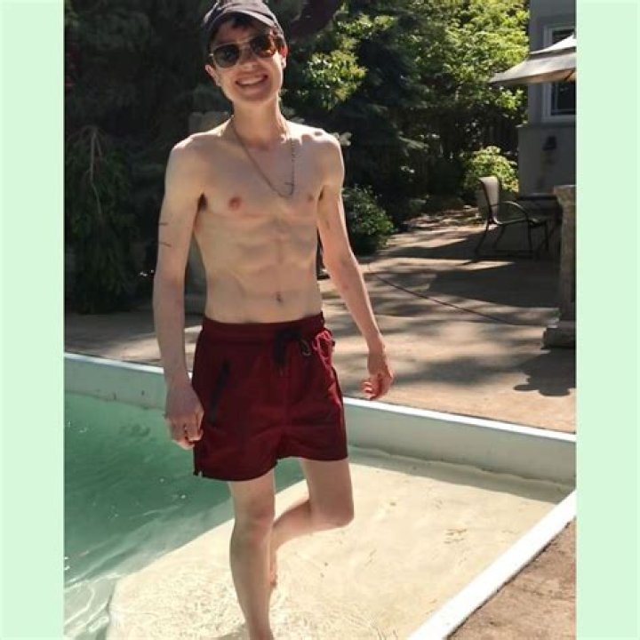 Elliot Page's Poolside Instagram Photo Is A Triumphant Celebration Of Trans Joy