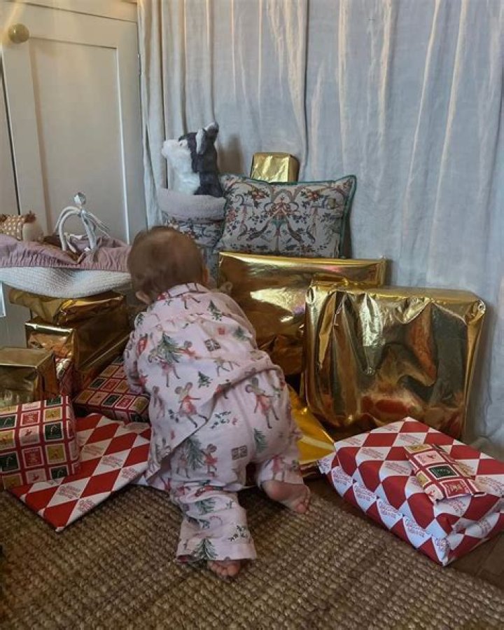 Kevin Clifton melts hearts with sweet photo of red haired daughter Minnie during her first Christmas