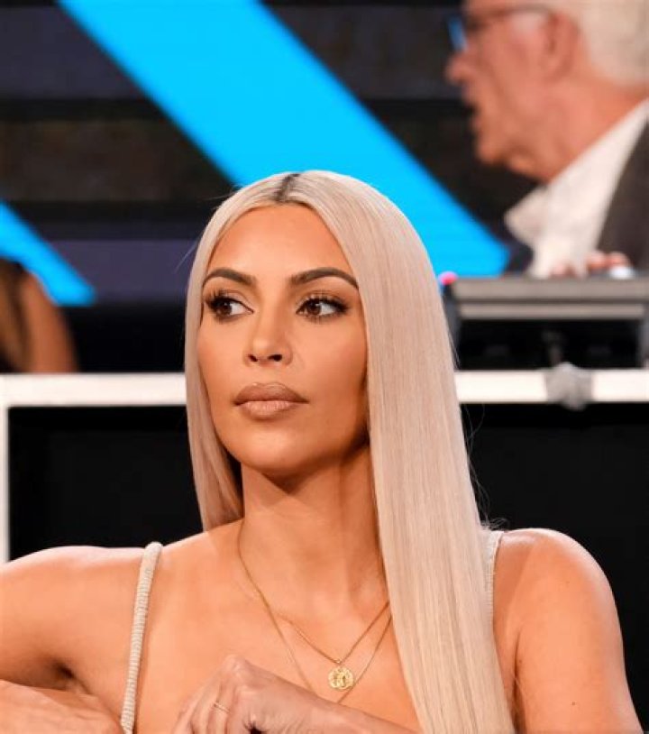 Kim Kardashian Poses Topless in Thong, Talks Grinding